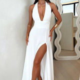 Elegant Wedding Guest maxi dress with halter neck and leg slit